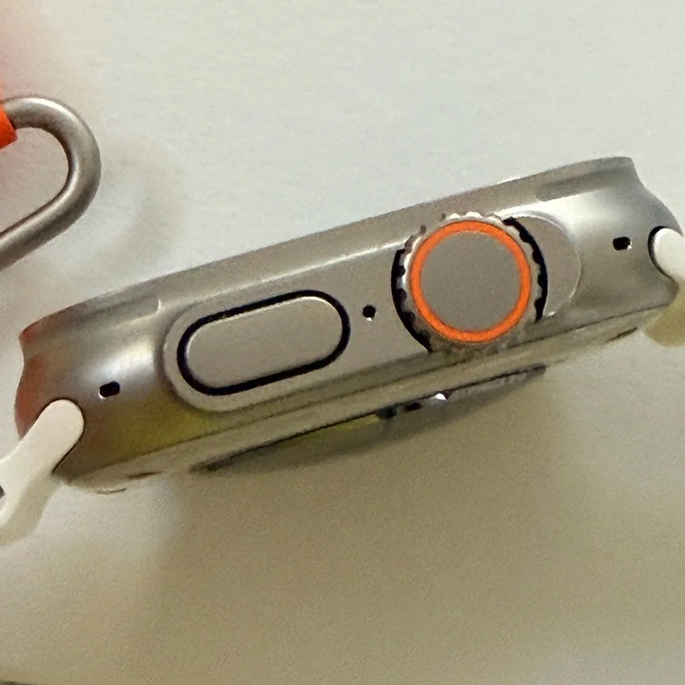Apple Watch Ultra 1st Gen Smartwatch with White, Orange, and Yellow Bands